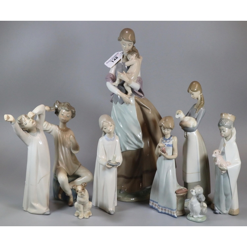 148 - Group of nine Spanish porcelain Lladro figurines to include: 'Peaceful Moment' depicting a mother an... 