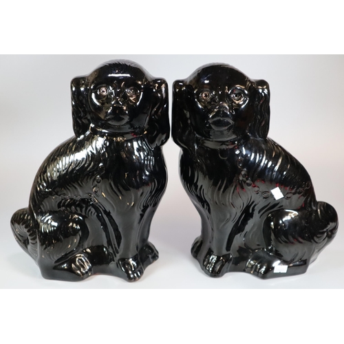 157 - Two pairs of Staffordshire pottery seated fireside Spaniels; one black pair with glass eyes. (4)
(B.... 