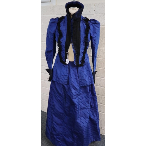 162 - Victorian blue brocade lady's outfit comprising skirt and jacket. (2)
(B.P. 21% + VAT)