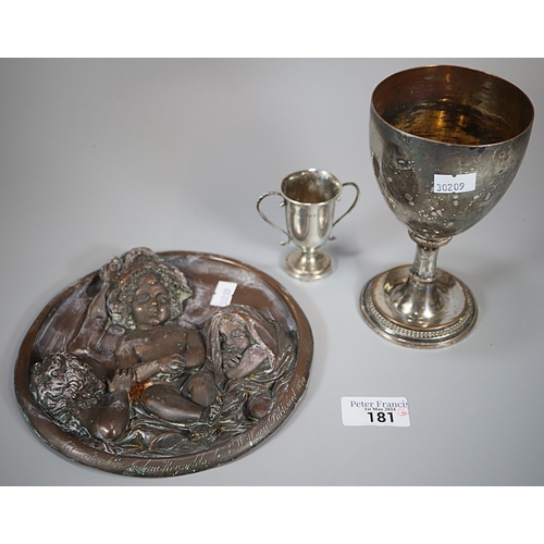 181 - Silver miniature two handled trophy cup.  0.7 troy oz approx. together with a white metal goblet.  8... 