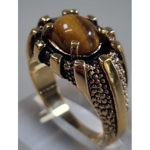 215 - 14K gold plated dress ring inset with Tiger's Eye stone.  Size S.   (B.P. 21% + VAT)