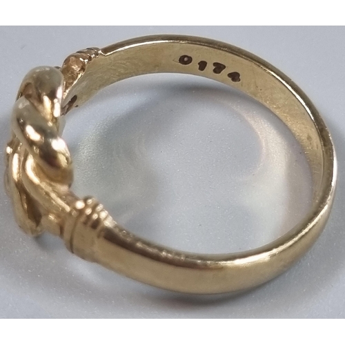 219 - 9ct gold knot design ring.  6.9g approx.  Size T1/2.   (B.P. 21% + VAT)