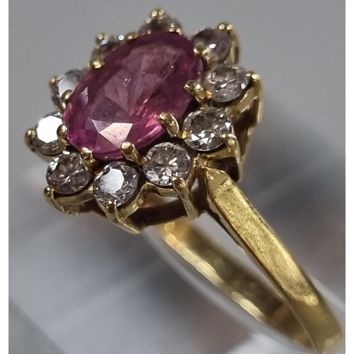 222 - 18ct gold pink stone and diamond cluster ring (possibly sapphire).  3.1g approx.   (B.P. 21% + VAT)