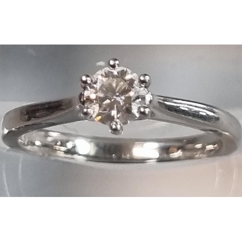 233 - Modern platinum and diamond solitaire ring marked 'Pravins', in Pravins ring box.  3.5g approx.  Siz... 