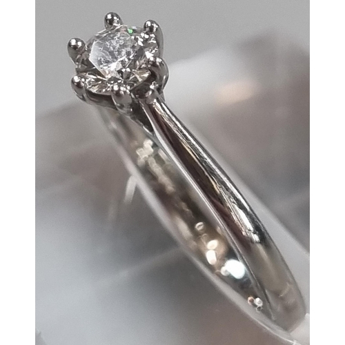 233 - Modern platinum and diamond solitaire ring marked 'Pravins', in Pravins ring box.  3.5g approx.  Siz... 