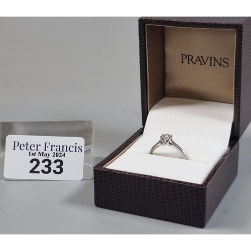 233 - Modern platinum and diamond solitaire ring marked 'Pravins', in Pravins ring box.  3.5g approx.  Siz... 