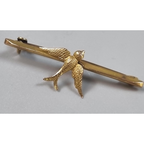 240 - 9ct gold swallow bar brooch.  1g approx.   (B.P. 21% + VAT)