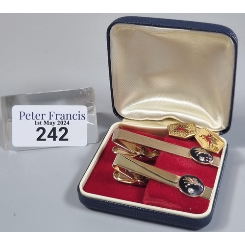 242 - Two similar tie pins, one marked 10K, both with gold pendants of Pegasus horse, ruby and diamonds. 1... 