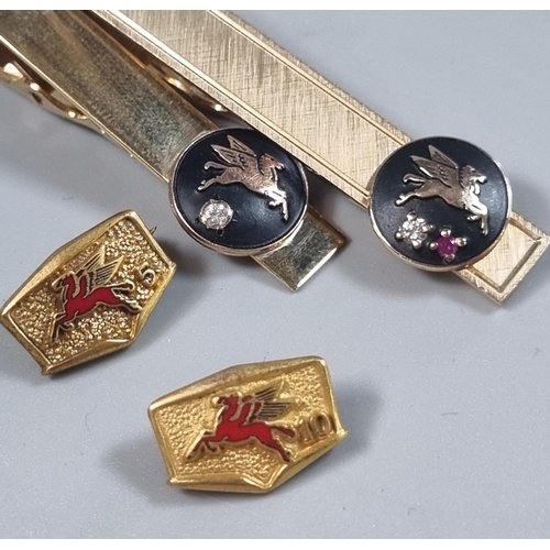 242 - Two similar tie pins, one marked 10K, both with gold pendants of Pegasus horse, ruby and diamonds. 1... 