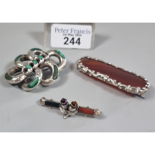 244 - Box containing Scottish Victorian and malachite lover's knot brooch together with an agate and silve... 