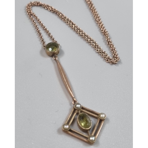 245 - Edwardian 9ct gold peridot and seed pearl pendant on fine link chain.  2.8g approx.   (B.P. 21% + VA... 