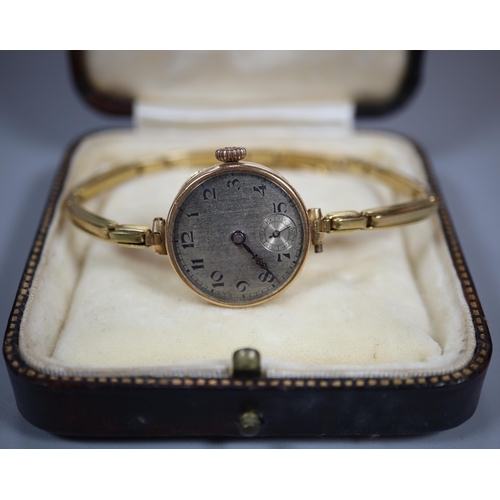 246 - Ladies 9ct gold vintage mechanical wristwatch with Arabic face having seconds dial, marked 'Magno' o... 