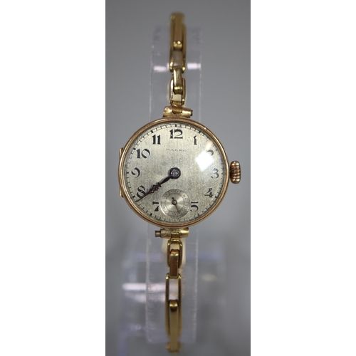 246 - Ladies 9ct gold vintage mechanical wristwatch with Arabic face having seconds dial, marked 'Magno' o... 