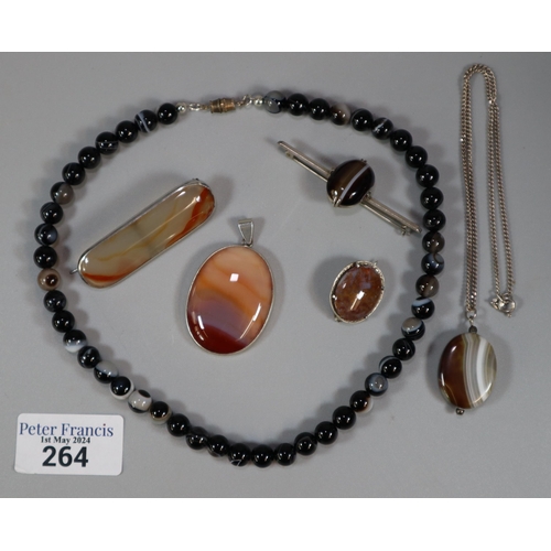 264 - Box of silver and Scottish agate jewellery to include: pendant brooch, bullseye necklace, agate pend... 