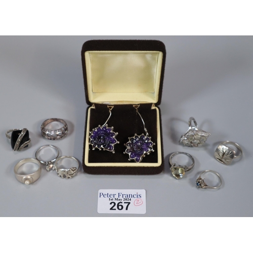 267 - Box assorted silver dress rings together with a pair of silver mauve shell earrings.   (B.P. 21% + V... 