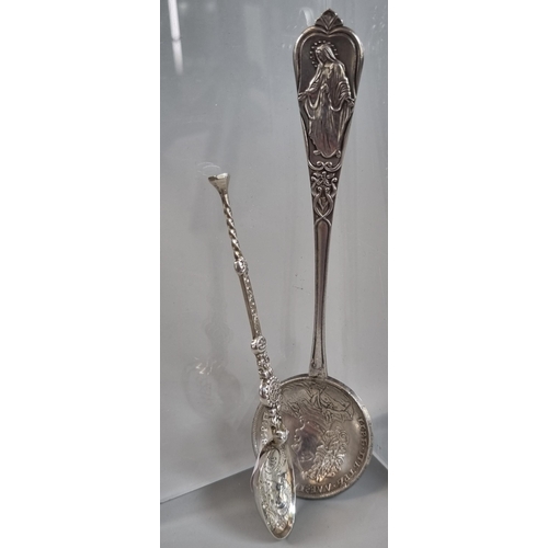 276 - Religious continental silver spoon with coin bowl.  1.3 troy oz approx. together with a miniature si... 