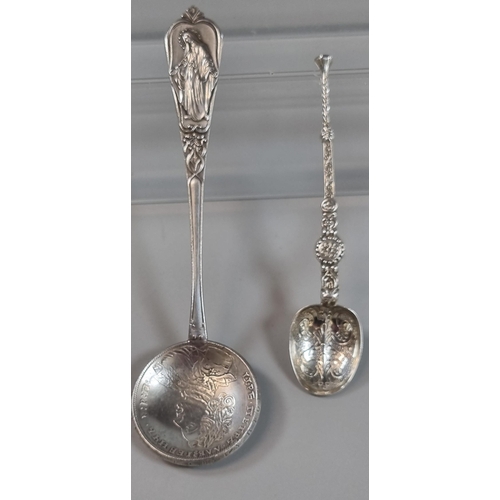 276 - Religious continental silver spoon with coin bowl.  1.3 troy oz approx. together with a miniature si... 