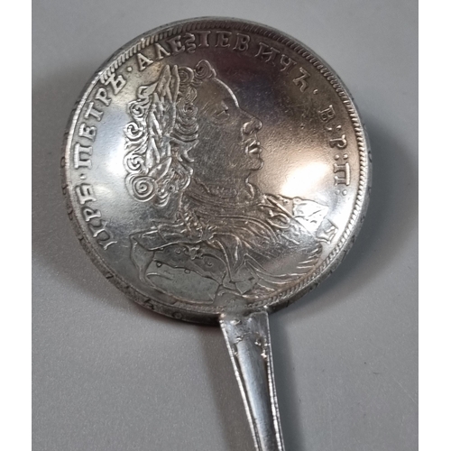 276 - Religious continental silver spoon with coin bowl.  1.3 troy oz approx. together with a miniature si... 