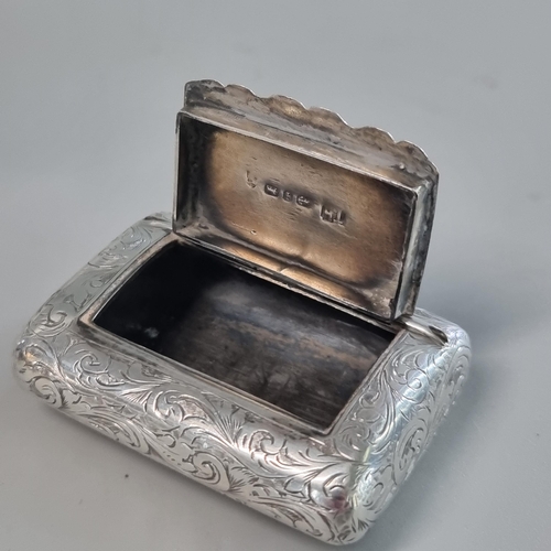 288 - 19th century silver cushion shaped snuff box with overall foliate engraved decoration and inscribed ... 