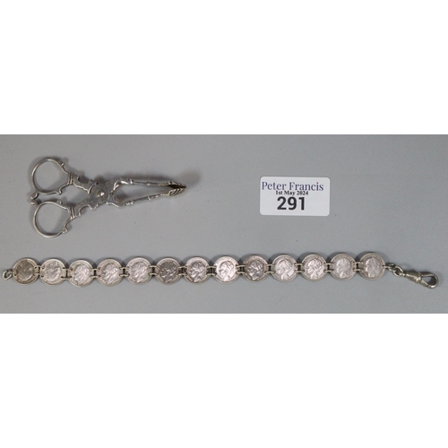 291 - Silver coin bracelet and pair of Georgian silver sugar nips.  1.28 troy oz approx.  (B.P. 21% + VAT)