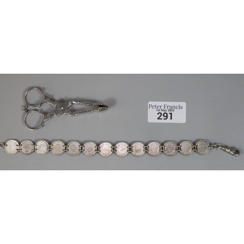 291 - Silver coin bracelet and pair of Georgian silver sugar nips.  1.28 troy oz approx.  (B.P. 21% + VAT)