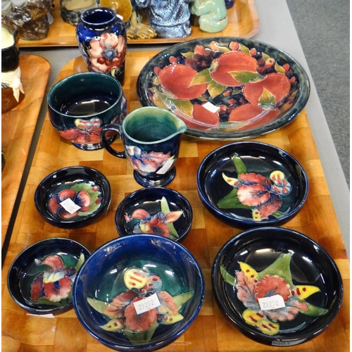 301 - Tray of Moorcroft art pottery tube lined items to include: various Iris design trinket bowls, Anemon... 