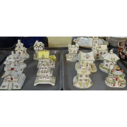 315 - Two trays containing twelve Coalport fine English bone china building ornaments to include: 'Swiss C... 