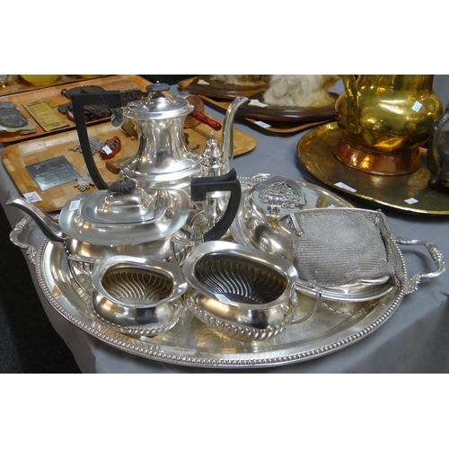 326 - Oval two handled silver plated tray containing various silver plated items; a four piece bachelors t... 