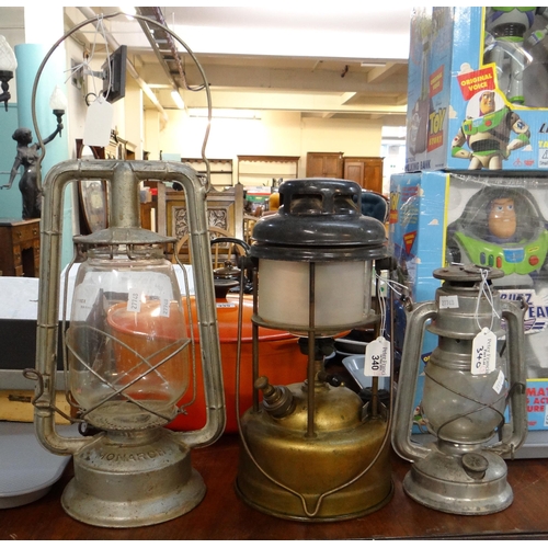 340 - Three vintage lanterns/lamps to include; a Deitz Monarch hurricane lamp, a tilly lamp and a small Me... 