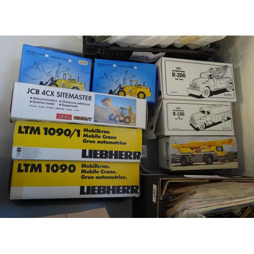 388 - Two trays Liebherr First Gear 1:34 scale etc. diecast model vehicles to include 1957 International T... 