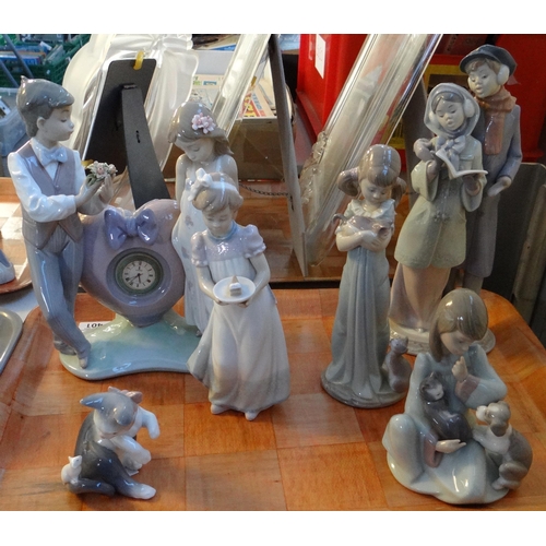 401 - Tray of Spanish porcelain Lladro figures to include: 'Time for Love' figure group with clock, 'Chris... 