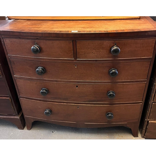 424 - Victorian mahogany bow front chest of two short and three long cock beaded drawers with turned handl... 