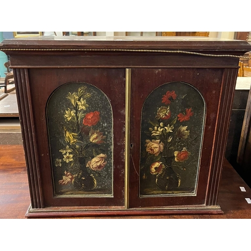 429 - 19th century mahogany table top two door collector's cabinet with painted panels of flowers and foli... 