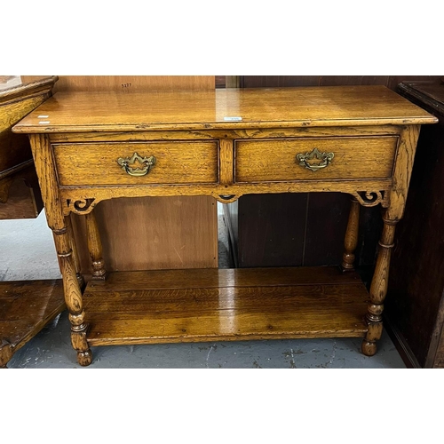 435 - Tudor Oak Furniture, contemporary good quality oak dresser base, having two drawers with under tier ... 