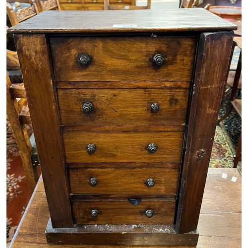 445 - 19th century miniature table top mahogany Wellington type chest of five drawers, the interior reveal... 