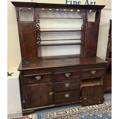 475 - Part 18th century oak two stage dresser, the base probably originally a coffer.  (B.P. 21% + VAT)