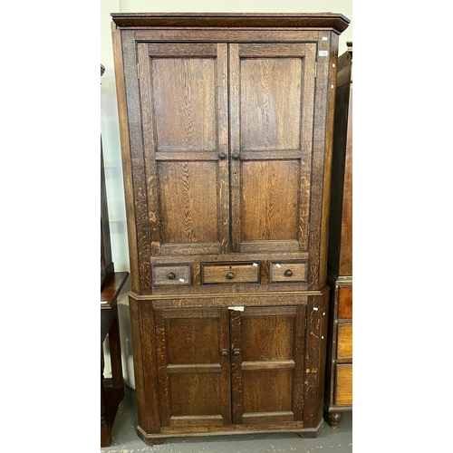 498 - 19th century oak two stage blind panelled corner cupboard.   (B.P. 21% + VAT)