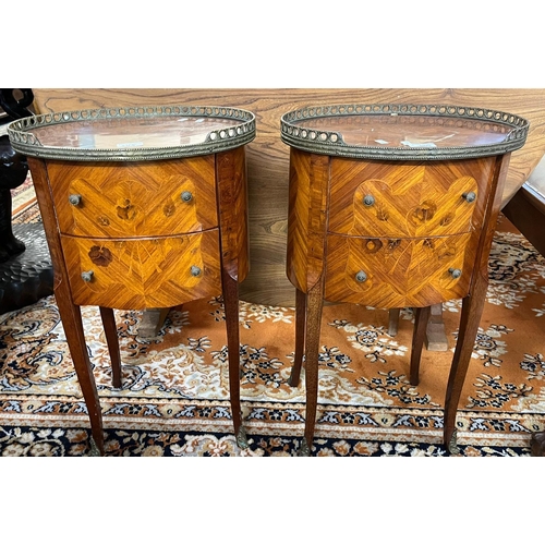 509 - Pair of French design Kingswood oval two drawer bedside cabinets.  40x33x67cm approx.  (2)  (B.P. 21... 