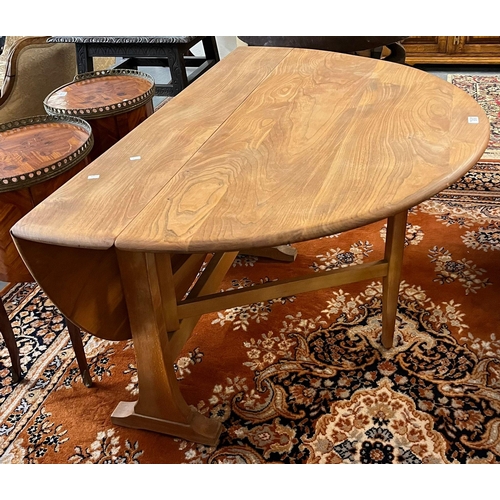 510 - Light elm Ercol 610 Gate leg dining table .   180x126x70cm approx. (B.P. 21% + VAT)