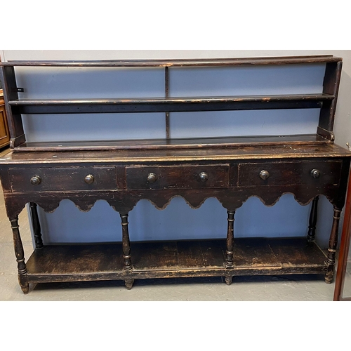 511 - 19th century stained pine pot board dresser, the moulded top above an arrangement of three drawers w...
