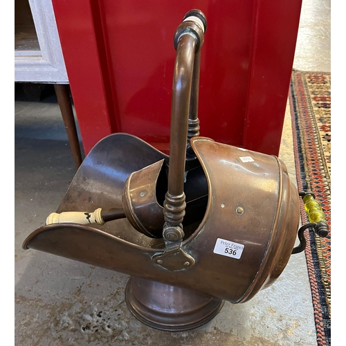 536 - 19th century helmet shaped pedestal coal scuttle with associated shovel.  (B.P. 21% + VAT)