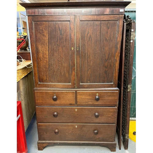 540 - 19th century oak two stage press cupboard, the moulded cornice above two blind panelled doors, the i... 