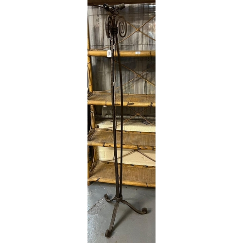 542 - Heavy cast iron tripod lamp base with scroll decoration.  (B.P. 21% + VAT)