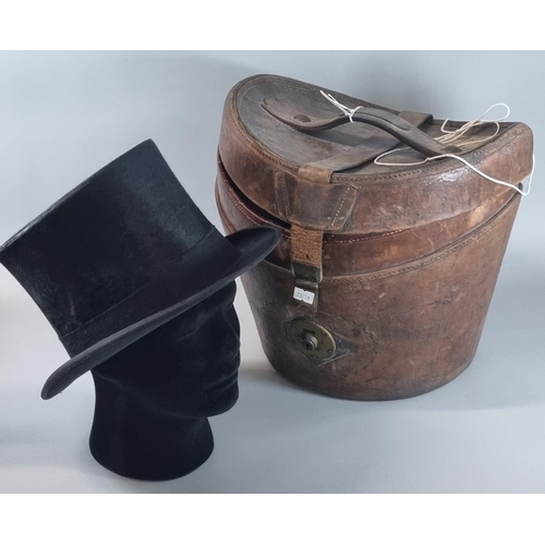 68 - A. J. White Hatters and Cap Makers, vintage top hat in fitted leather case.  (Mannequin head for dis... 