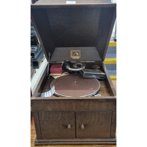 71 - Early 20th century oak cased His Master's Voice table top gramophone.  (B.P. 21% + VAT)