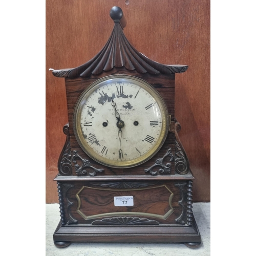 77 - Early 19th century rosewood pagoda shaped two train mantel clock, having painted Roman face marked W... 