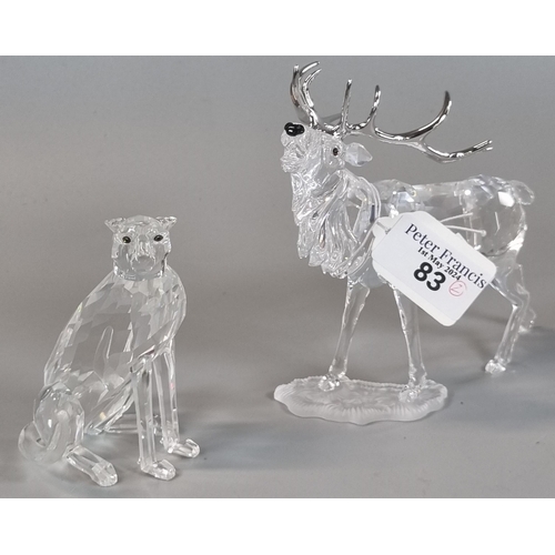 83 - Two Swarovski Crystal animals to include: seated cheetah and stag, both in original boxes.  (B.P. 21... 