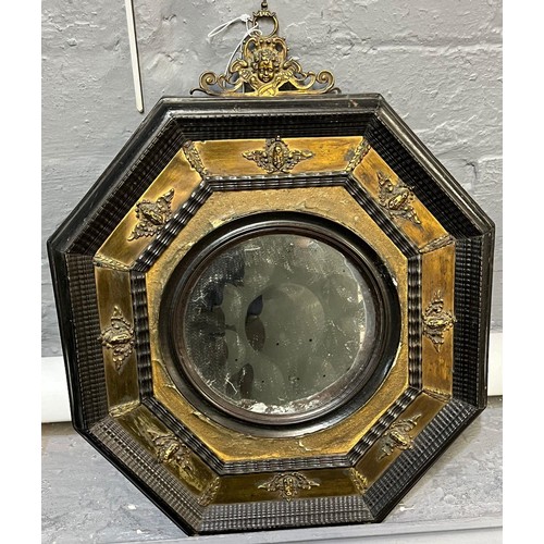 114 - 18th century octagonal framed bullseye mirror with gilt metal mounts.  34cm wide approx.   (B.P. 21%... 