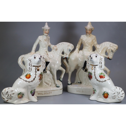 151 - Staffordshire 'Wolseley' flat back figures on horseback, together with a pair of Staffordshire style... 