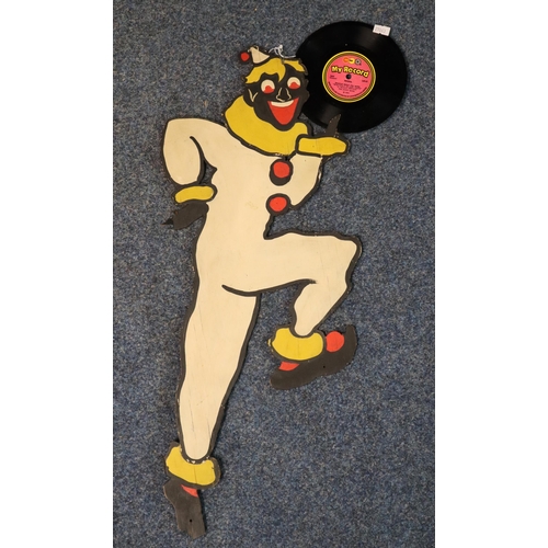 159 - Printed/painted carboard clown figure holding a 1974 vinyl record 'Whistle while you work' by The Ha... 